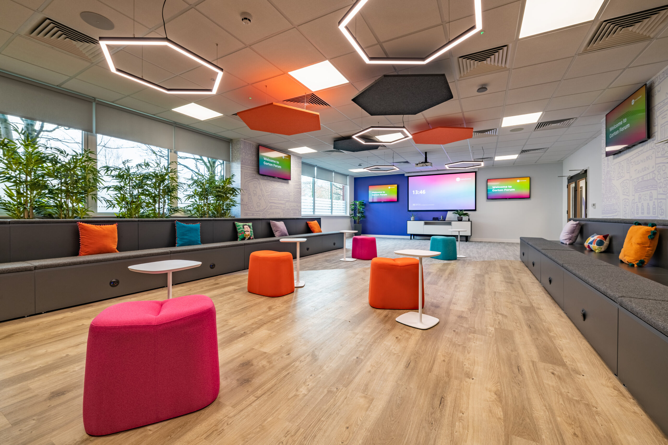 Office meeting space with colourful quilted stools