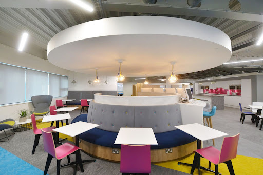 circular office space with tables and chairs